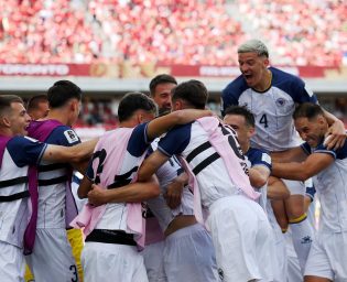 TORONTO, ONTARIO - JUNE 12: Jovo Lukic #25 of Bosnia and Herzegovina celebrates with teammates after scoring the team's first goal during the FIFA World Cup 2026 Group B match between Canada and Bosnia and Herzegovina at Toronto Stadium on June 12, 2026 in Toronto, Ontario. (Photo by Maja Hitij - FIFA/FIFA via Getty Images)