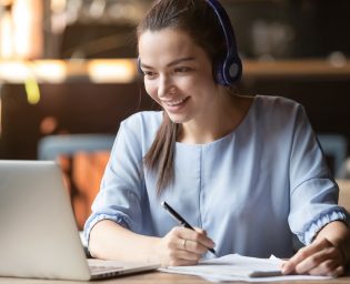 Smiling,Girl,Student,Wear,Wireless,Headphone,Study,Online,With,Skype
